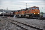 Grain train rolls east through University